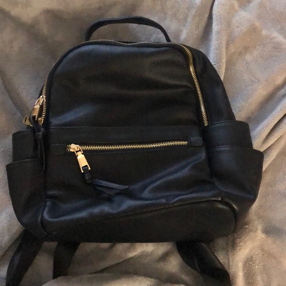 Black faux leather backpack purse